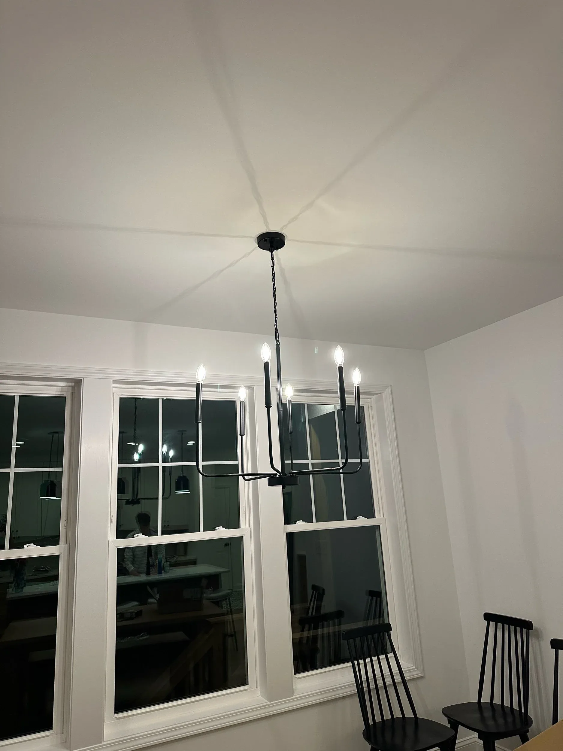 Black Candelabra Chandelier Dining Room Installation