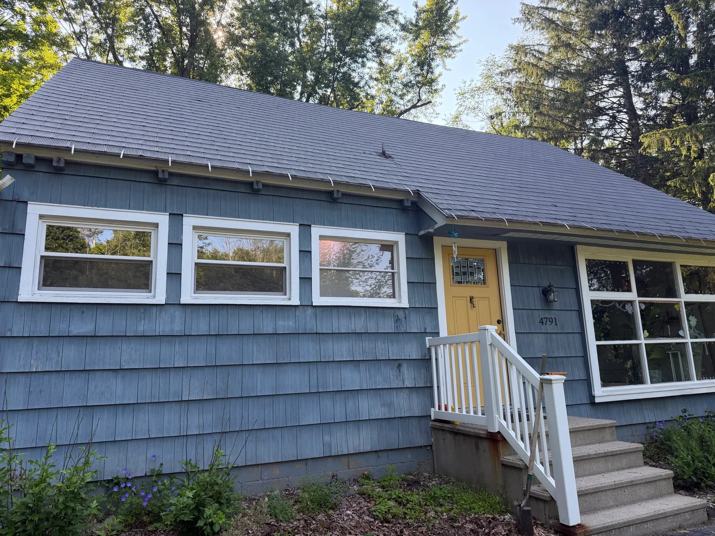 Blue Cottage Yellow Front Door New Gutter Install 4791