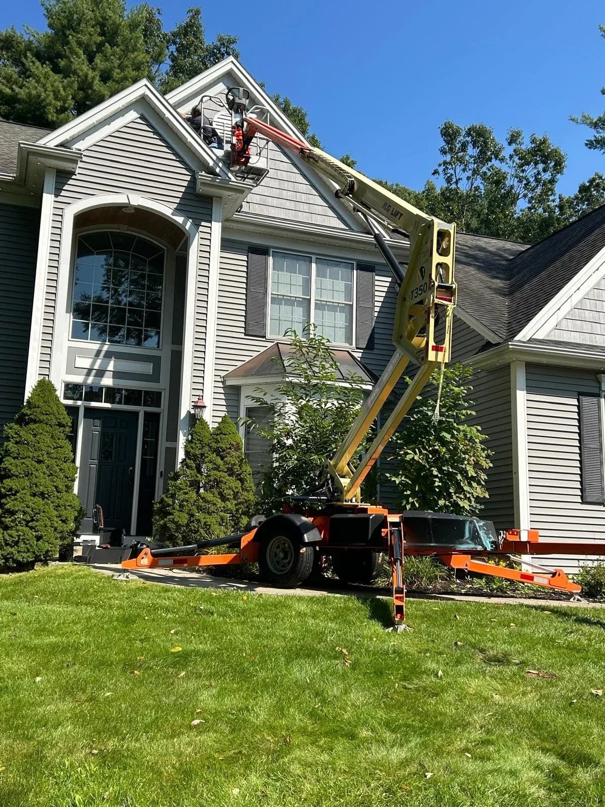 Bucket Lift Gable Siding Repair Summer Daytime