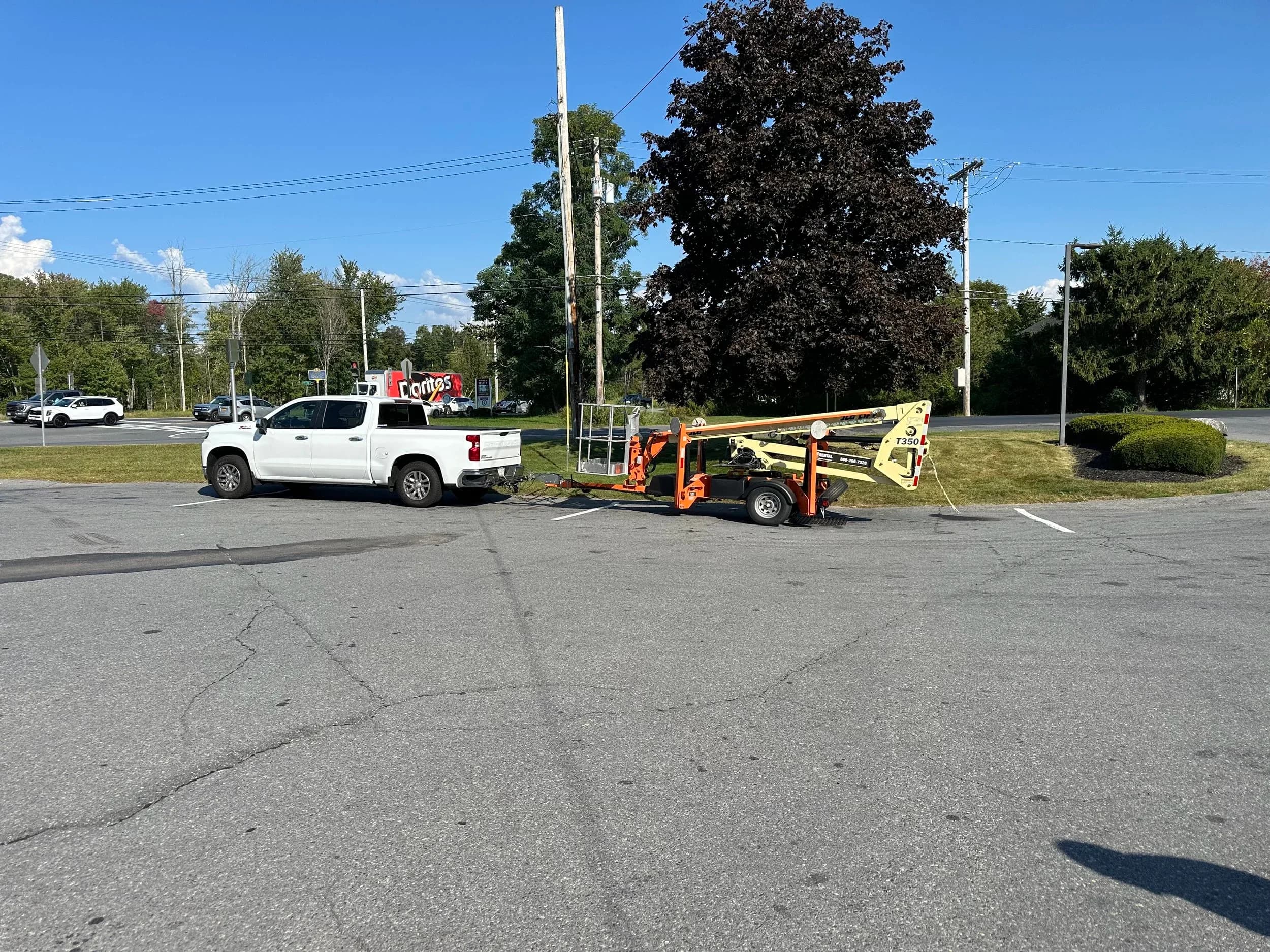 Bucket Lift Trailer Service Truck Parking Lot