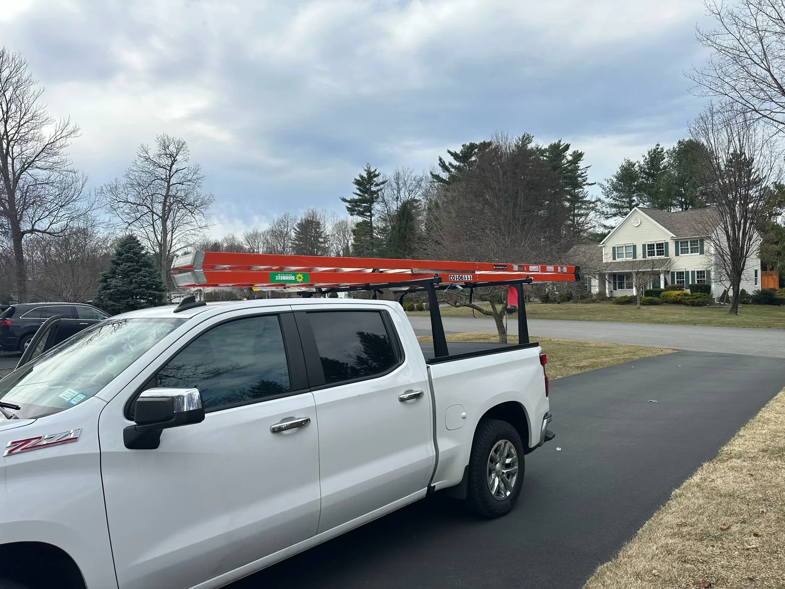 Company Work Truck Ladder Rack Residential Driveway