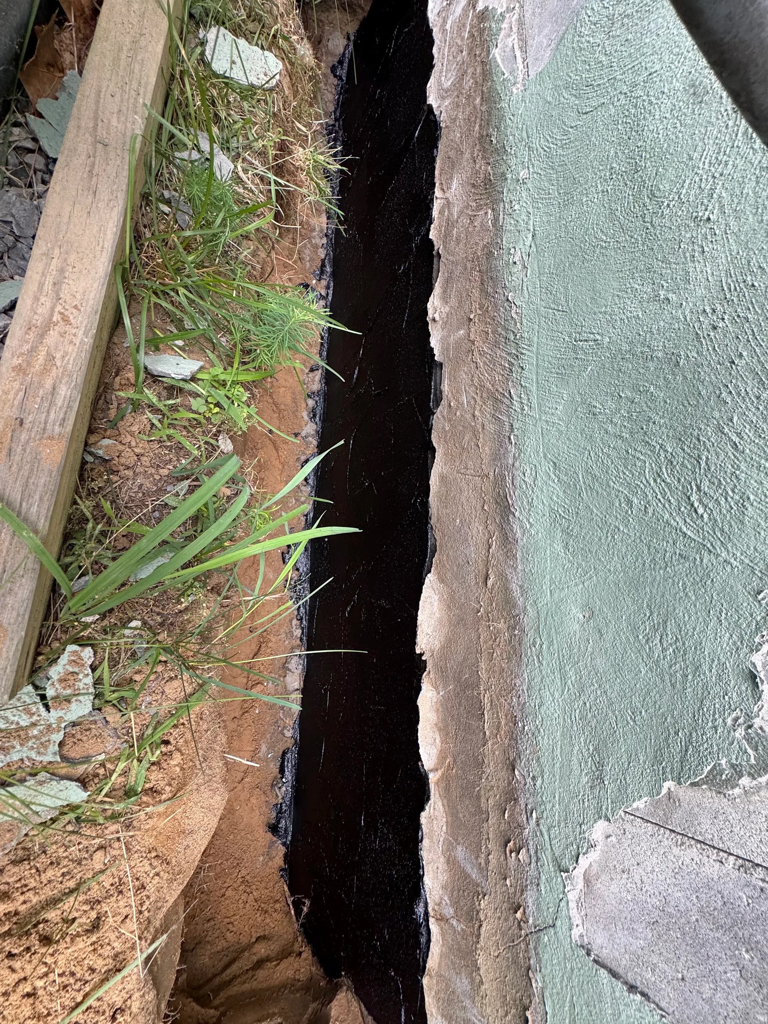 Foundation Waterproofing Membrane Trench Grass Roots Closeup