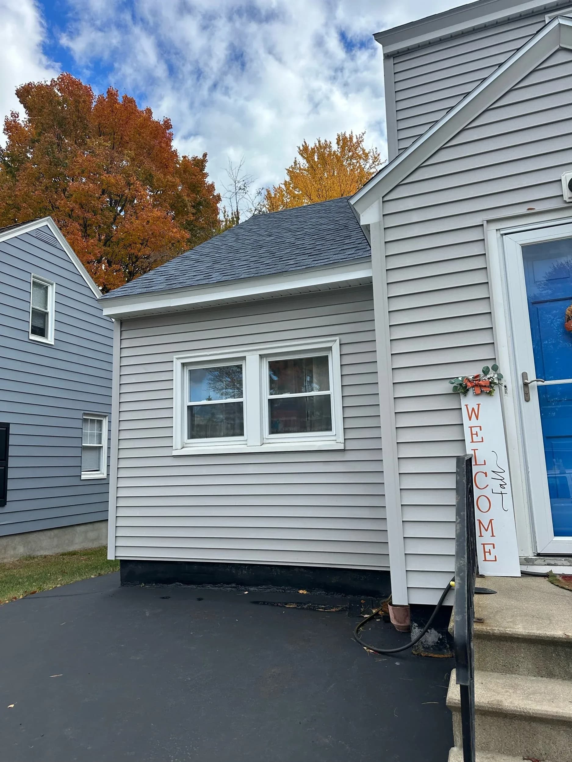 Gray Siding Home Addition Corner Before Shutters
