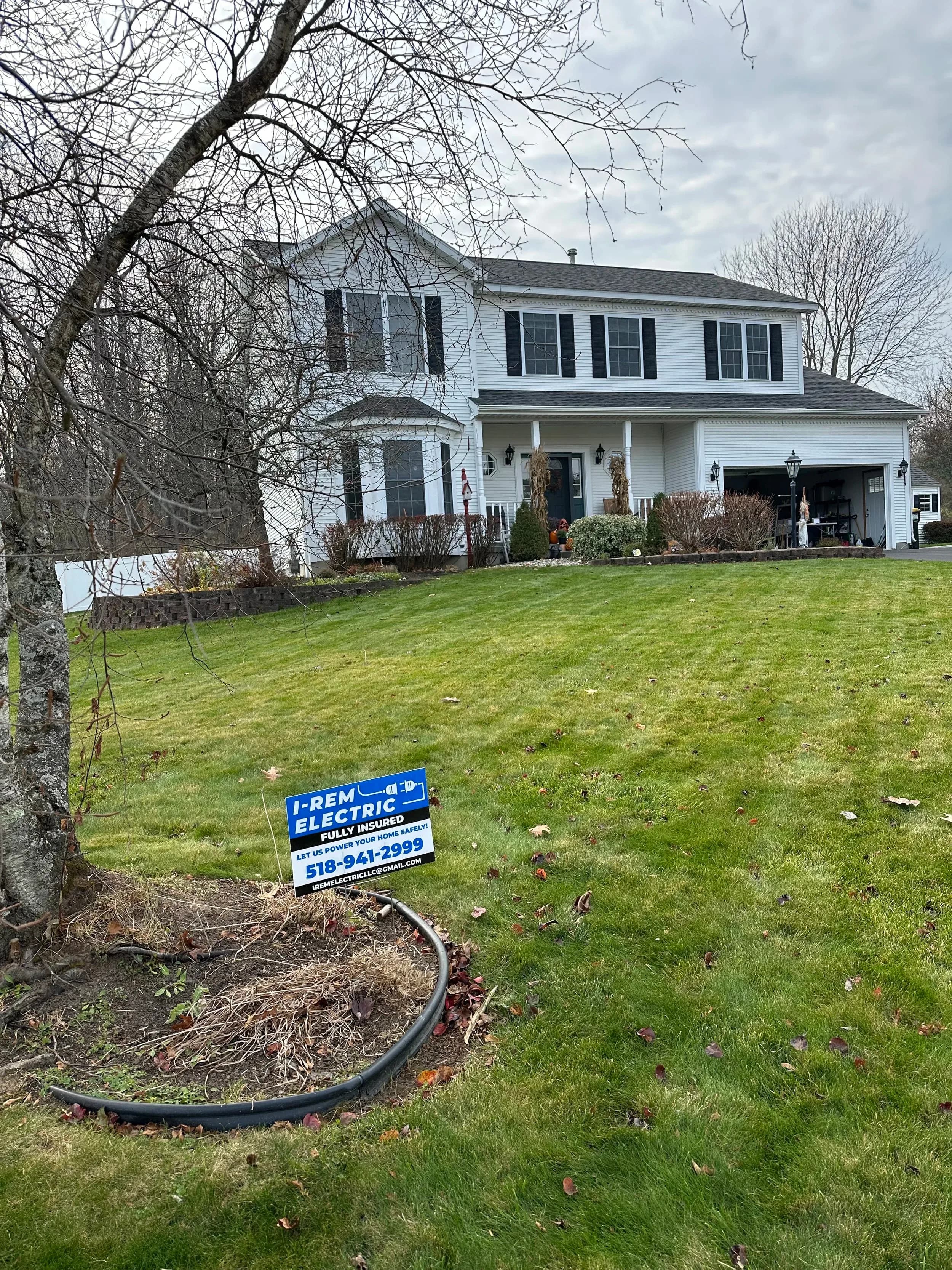 I Rem Electric Yard Sign With Conduit Coil Front Lawn