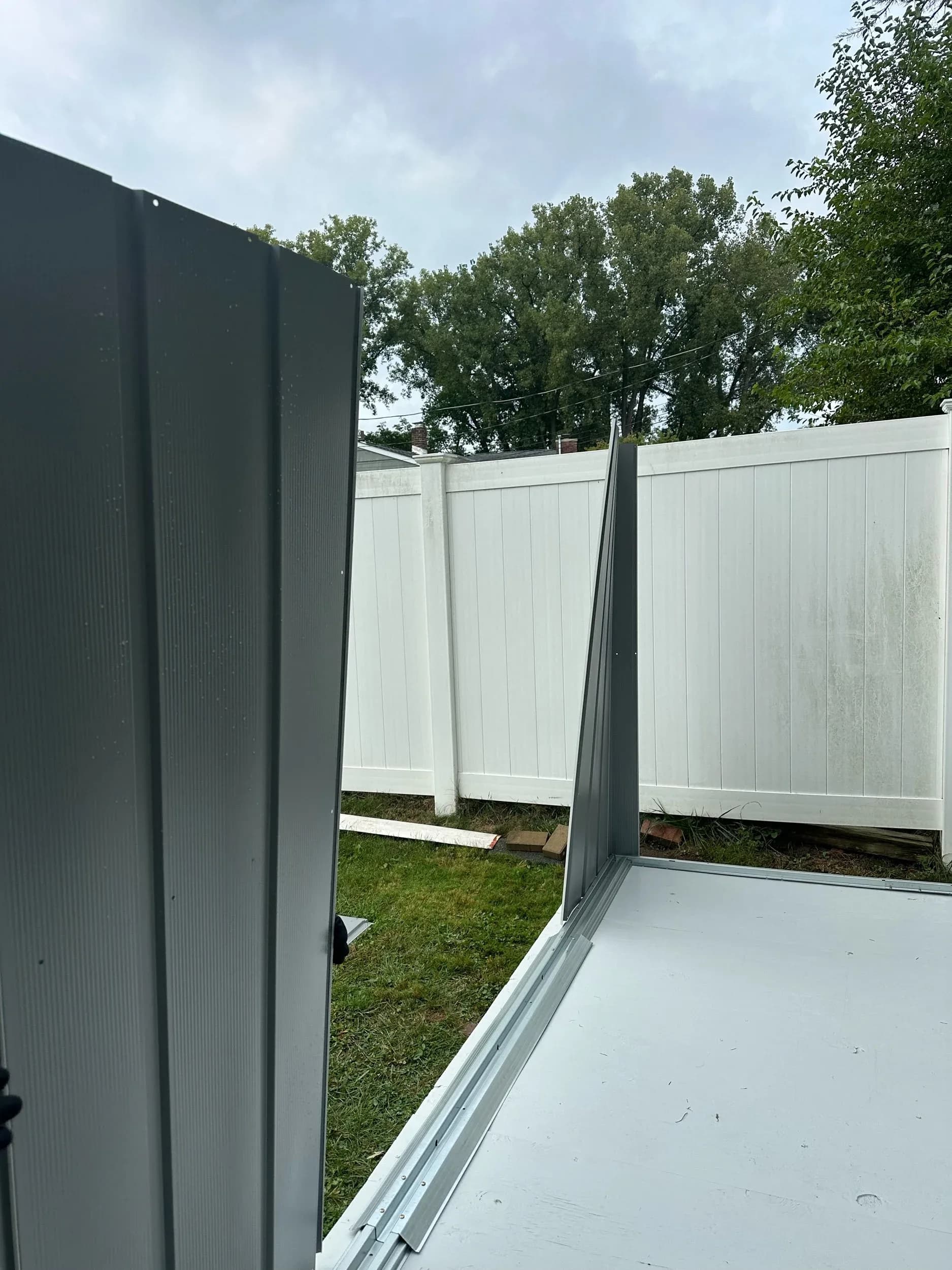 Metal Storage Shed Roof Panel Installation