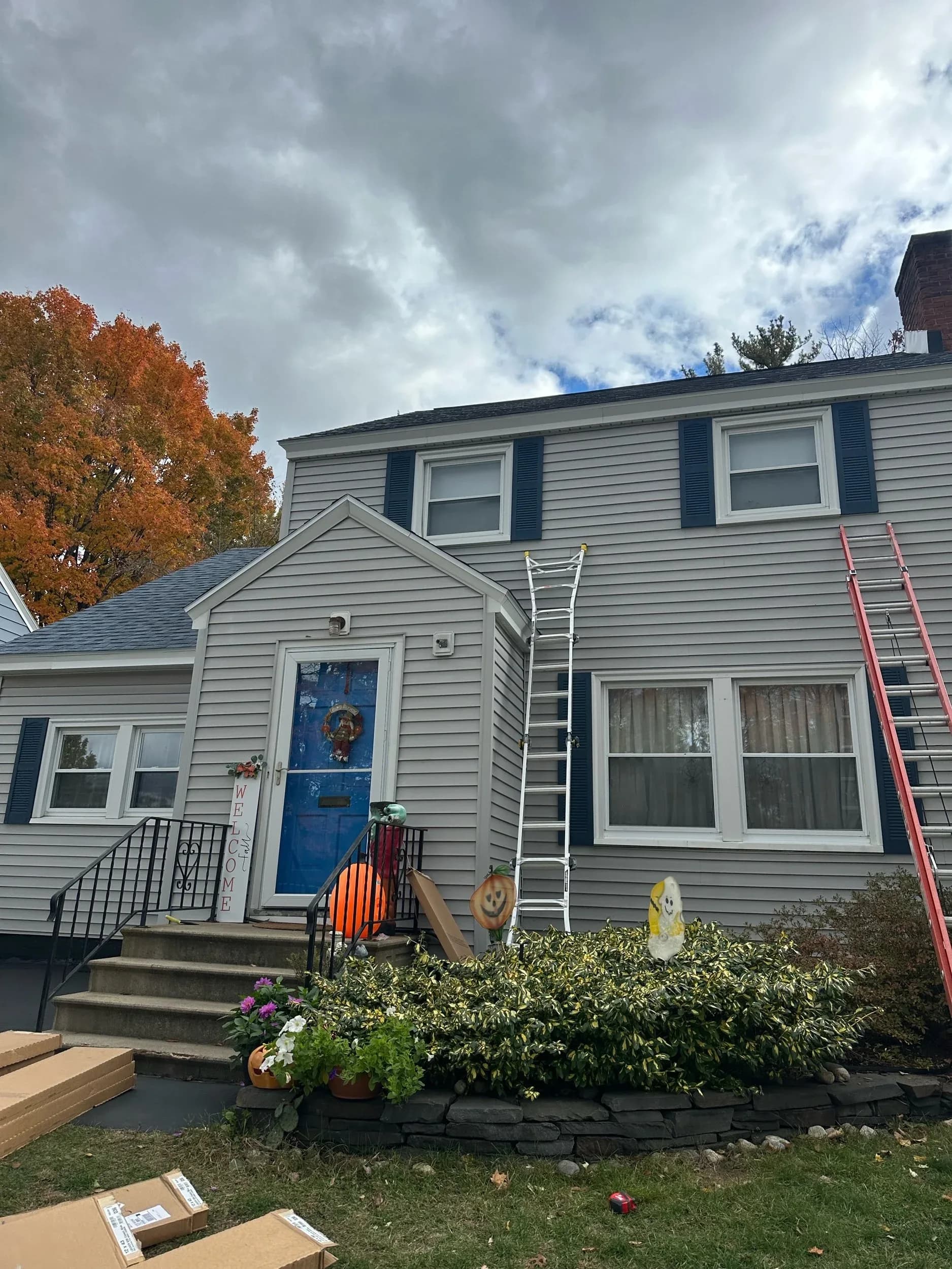 Navy Shutters Installed Full Exterior View