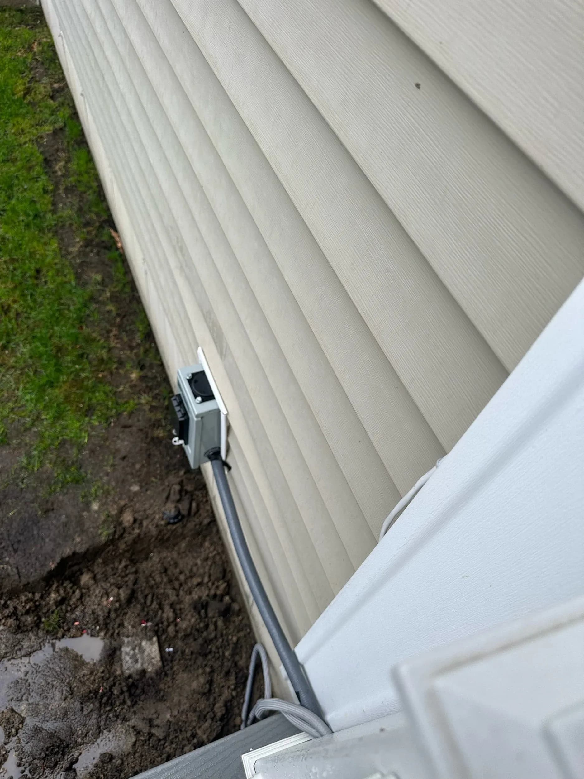 Outdoor Electrical Disconnect Box Top View Siding