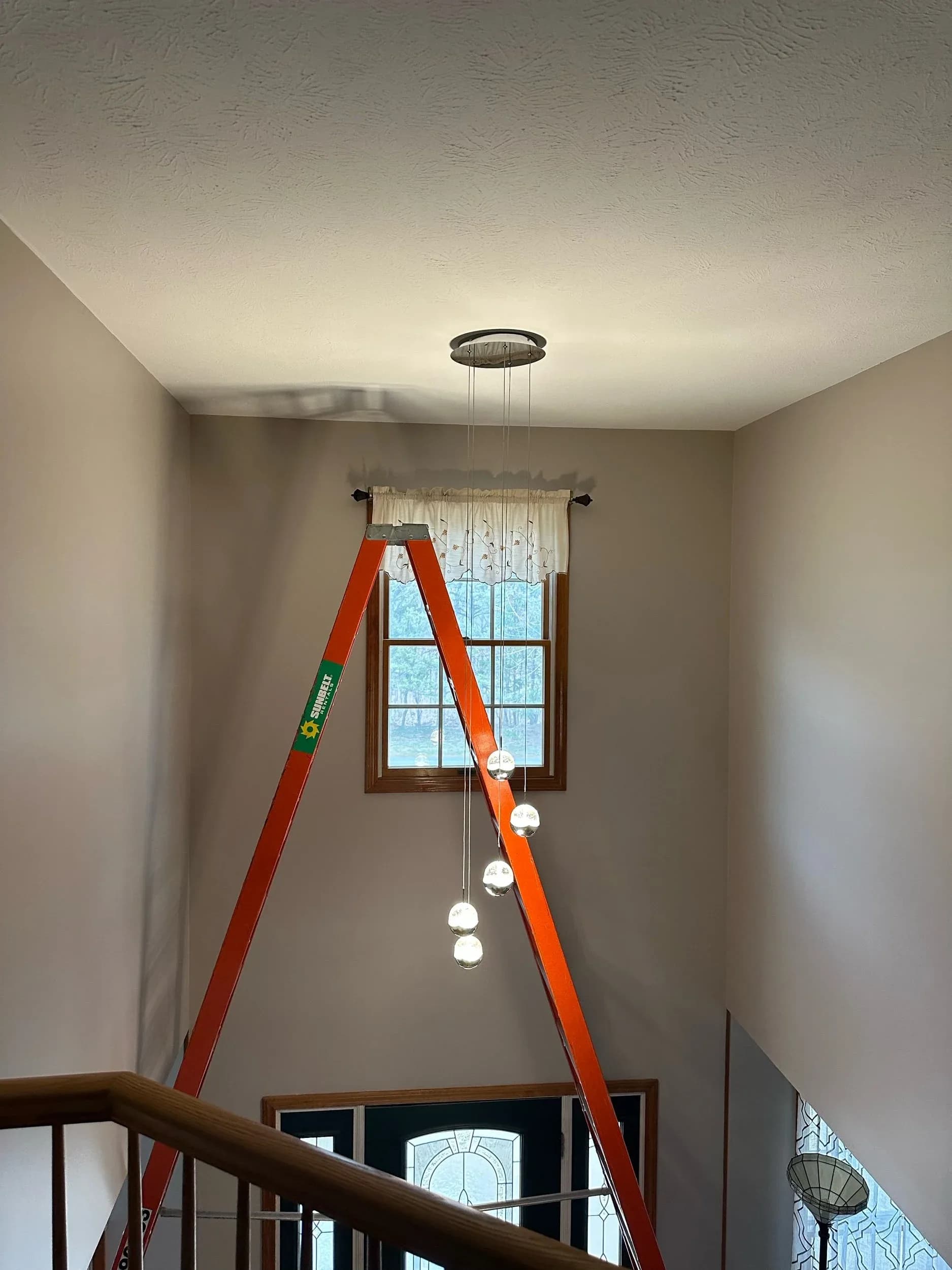 Raindrop Orb Pendant Light Staircase Installation