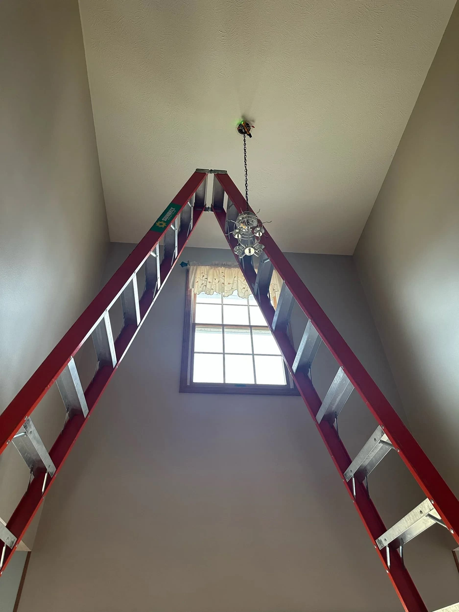 Red Ladder Foyer Cage Pendant Light Installation