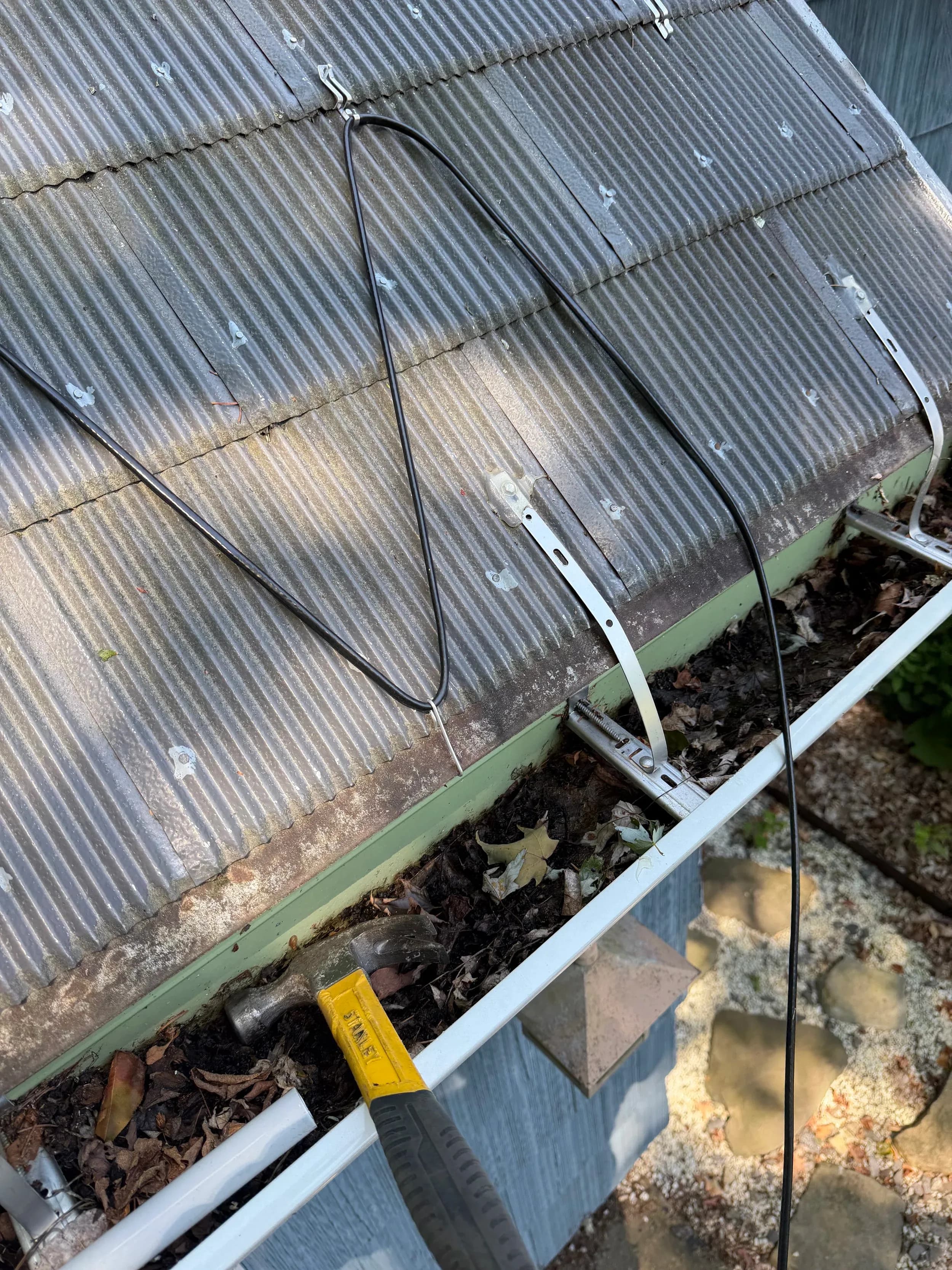 Roof Edge Heat Cable Clip Installation With Hammer
