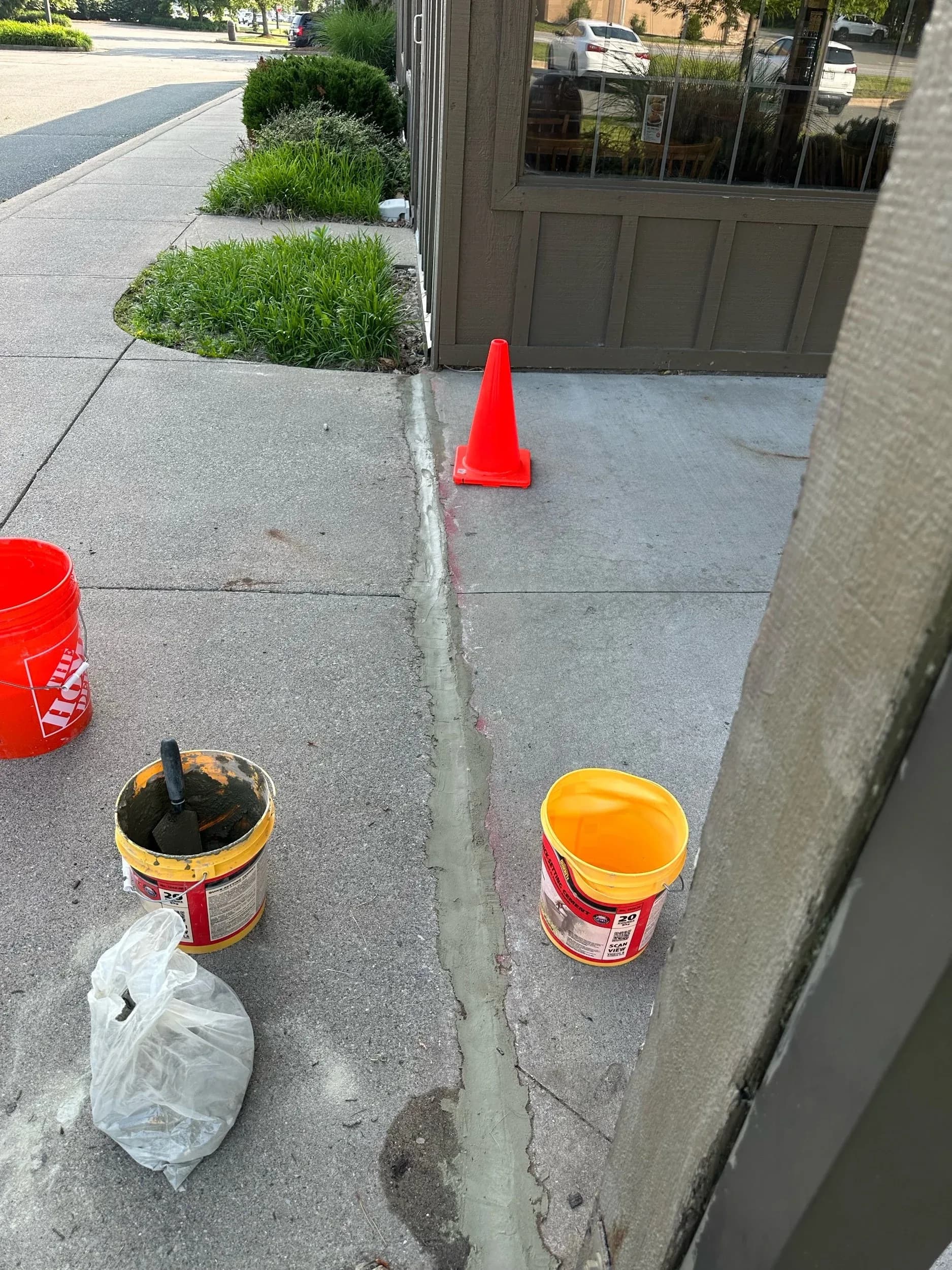 Sidewalk Concrete Crack Repair Storefront Entrance
