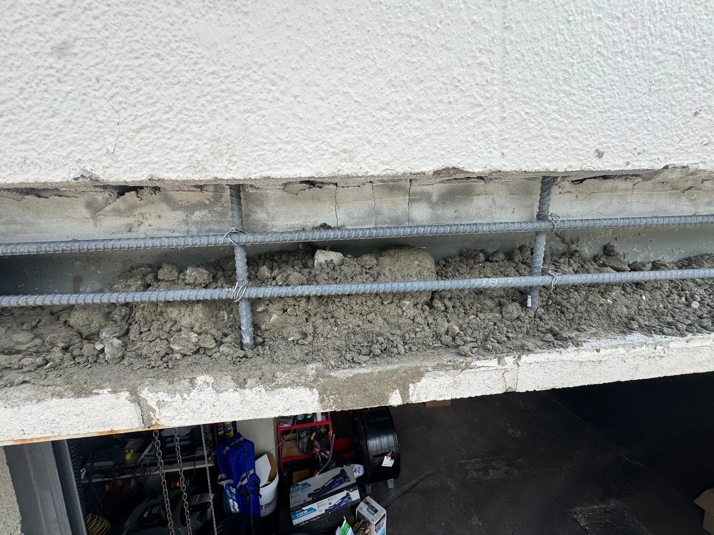 Spalling Concrete Rebar Detail Above Warehouse Dock Door