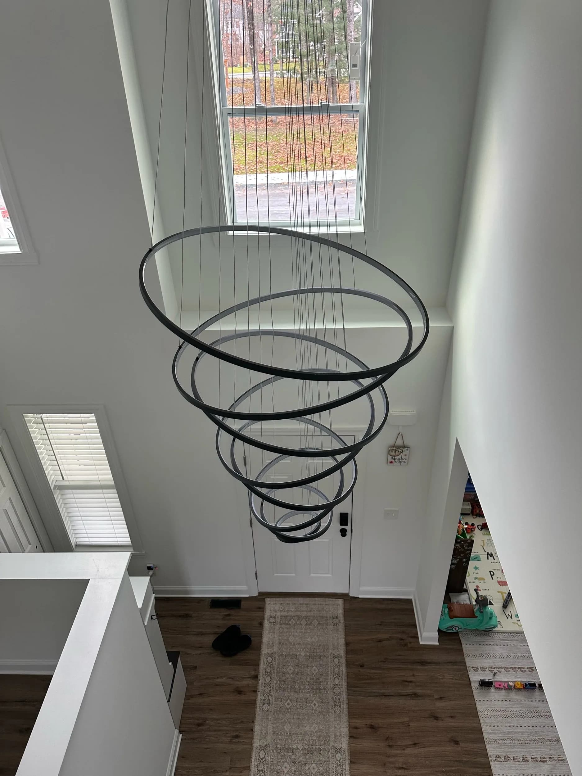 Spiral Chandelier Unlit Living Room Fireplace