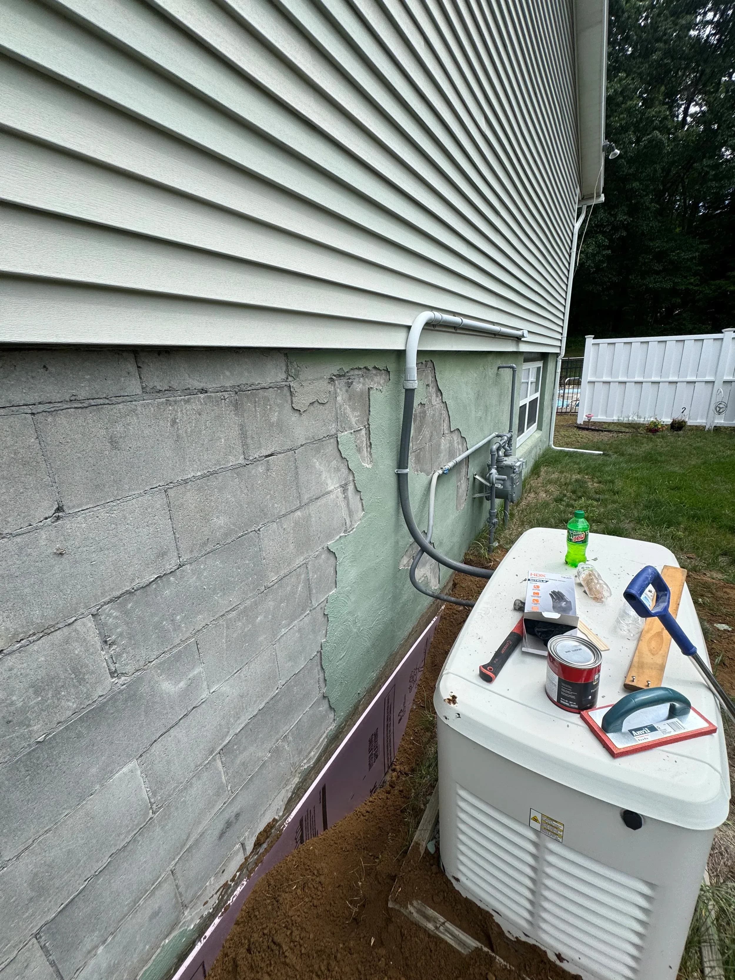 Standby Generator Foundation Stucco Repair Gas Meter Pool Fence