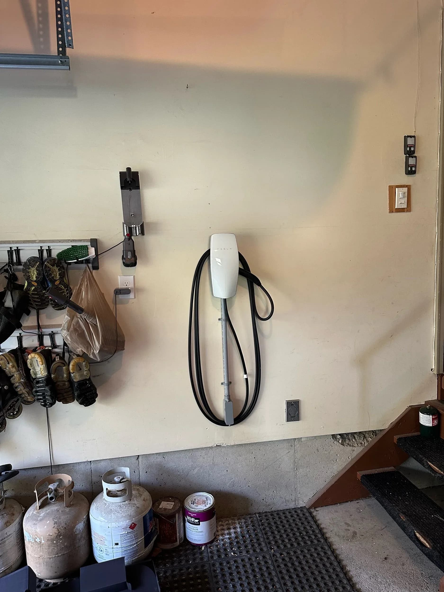 Tesla Wall Connector EV Charger Garage Door View
