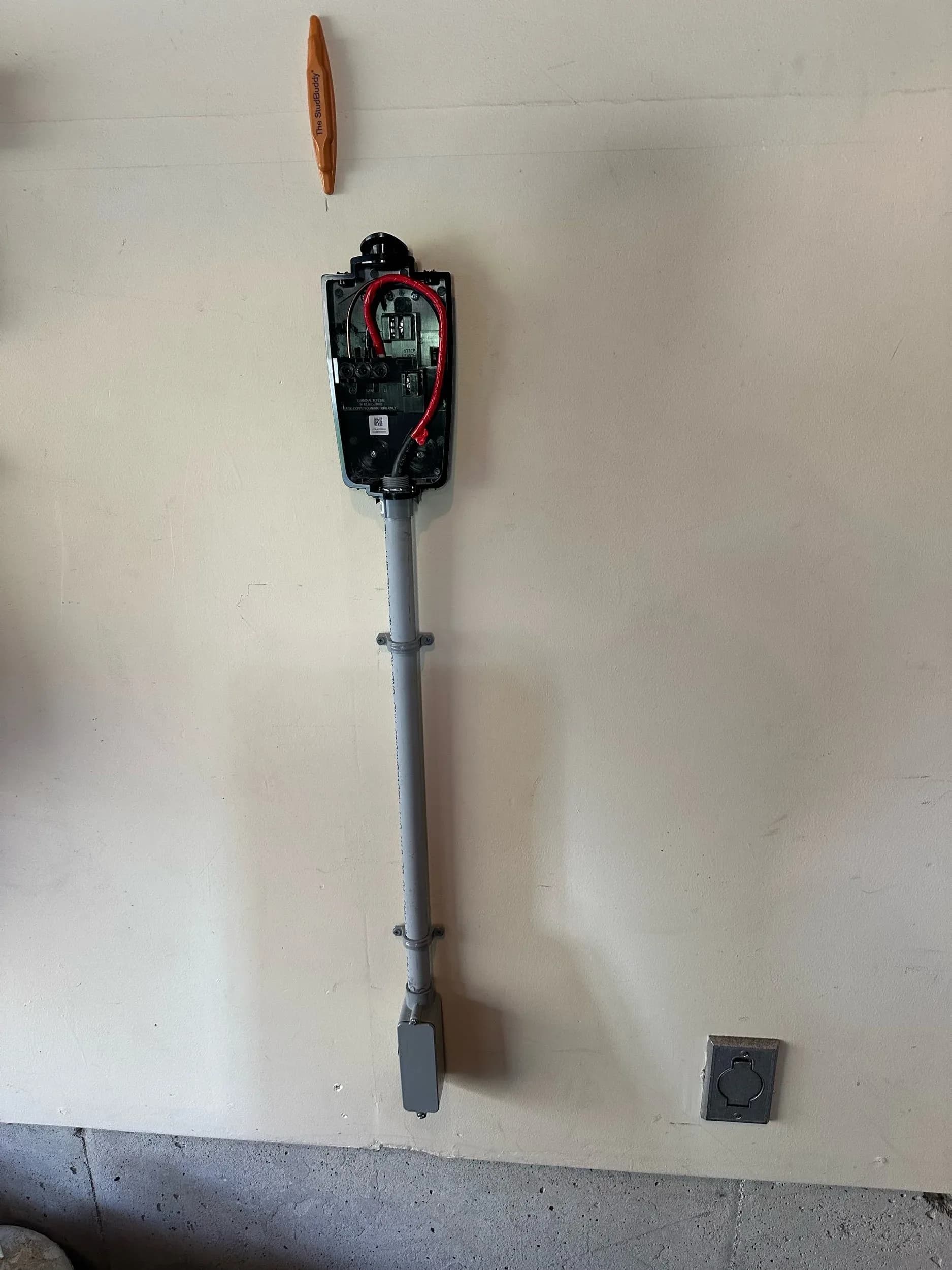 Tesla Wall Connector EV Charger Installed Garage Shoe Rack