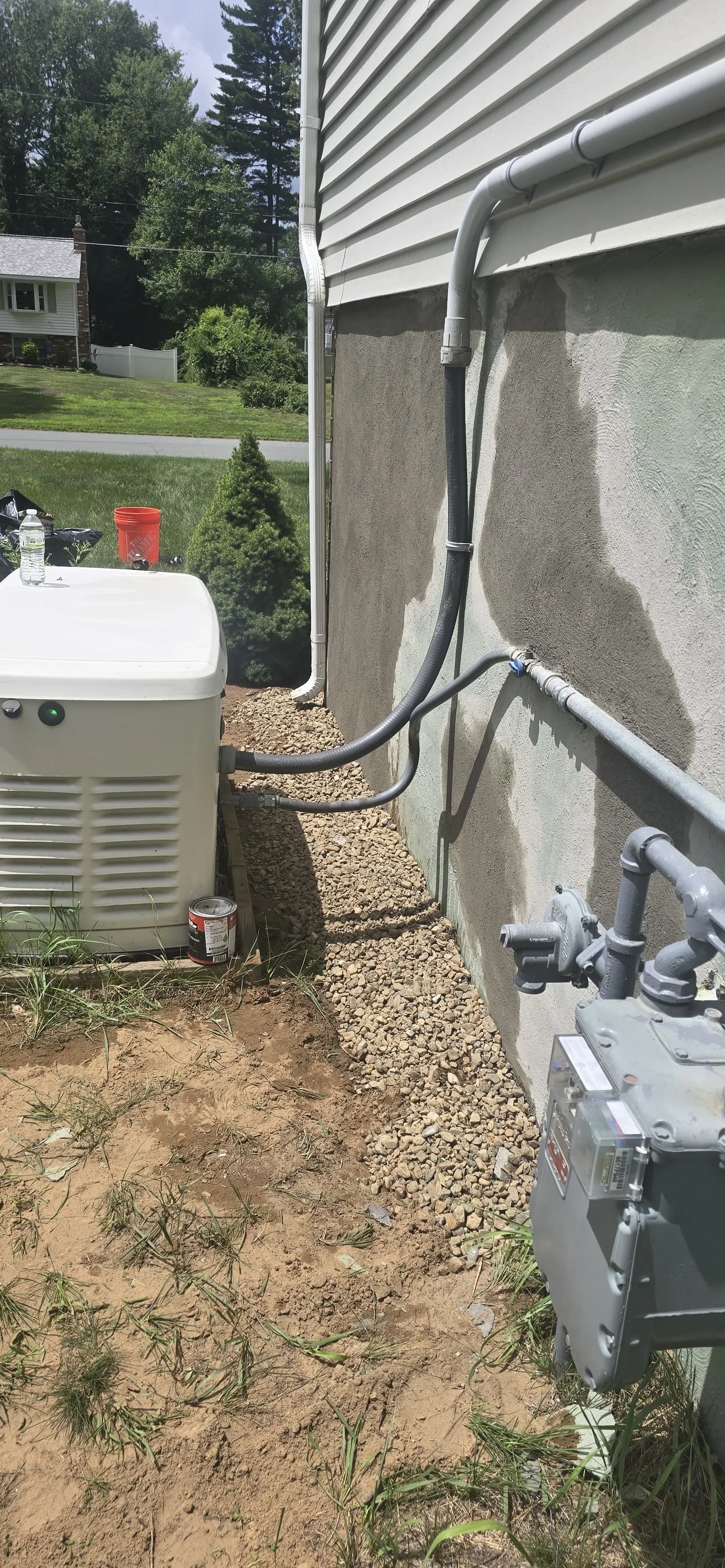 Standby generator gas meter and conduit connection